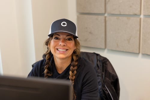 a CIRANDA Employee smiling, ready to help a CIRANDA Employee smiling, ready to help